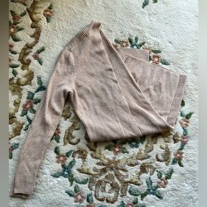 Neutral cardigan, light material.